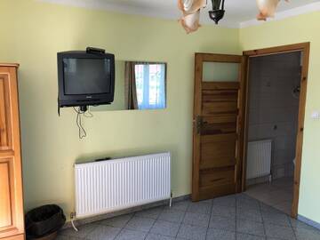 Фото номера Трехместный номер с ванной комнатой Фермерские дома Agropensjonat Furtak г. Пасленк 4